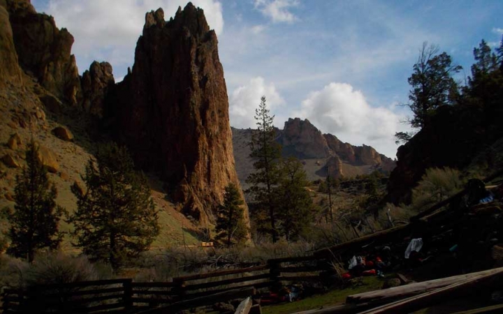 Large rock formations jut upwards under a blue sky